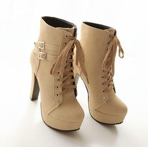 The patent leather block heel ankle boot.