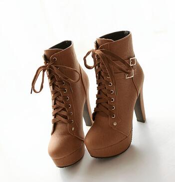 The patent leather block heel ankle boot.