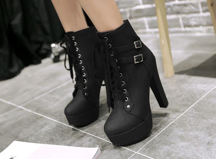 The patent leather block heel ankle boot.