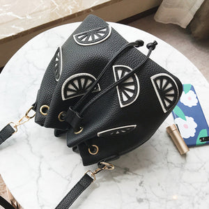 The lychee pattern shoulder bag.